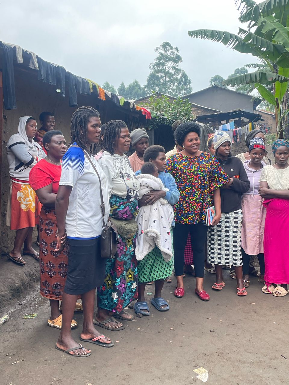 Founder Ruth Katusabe with mothers in Fort Portal