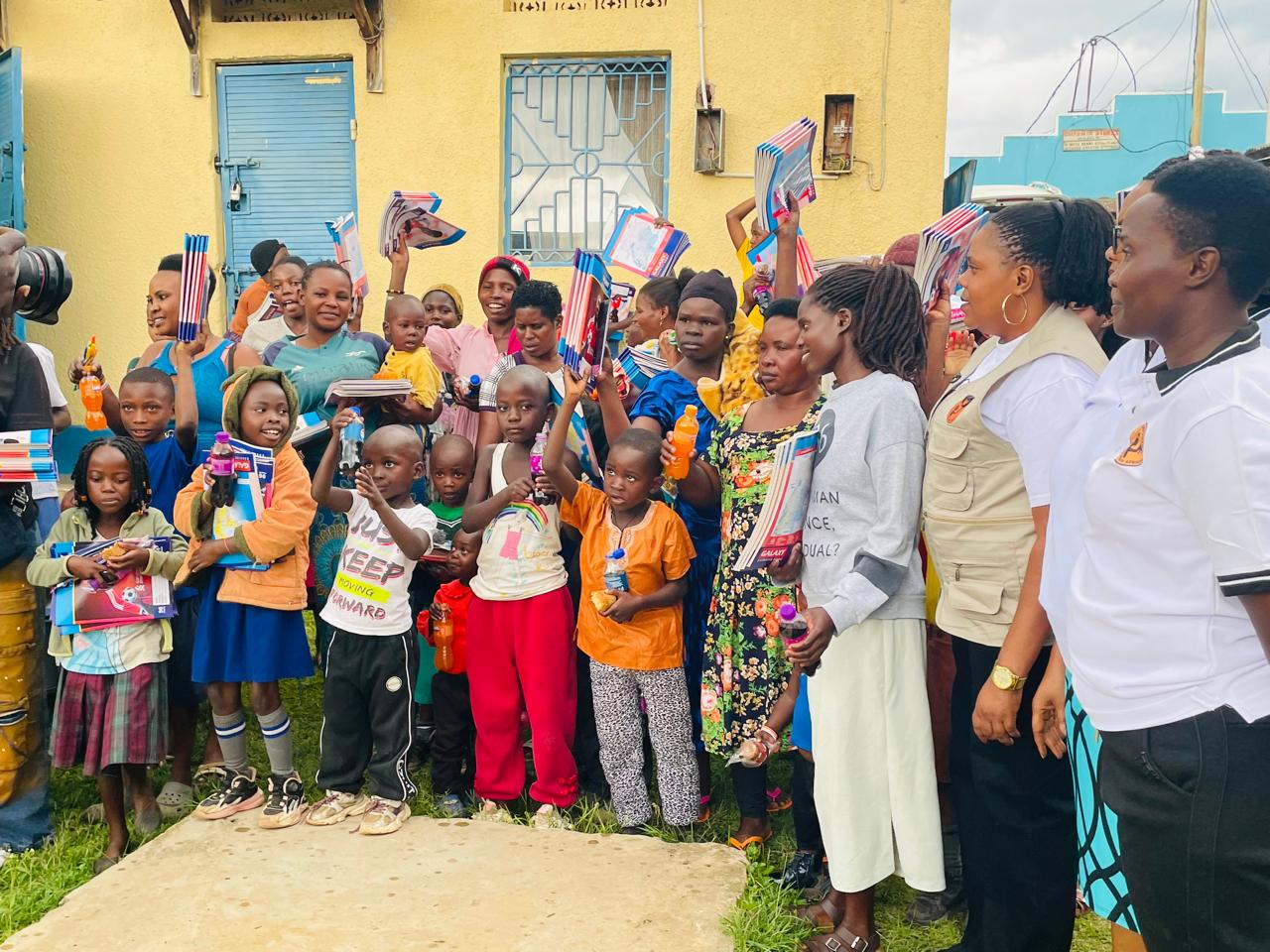 Children and mothers celebrating education support